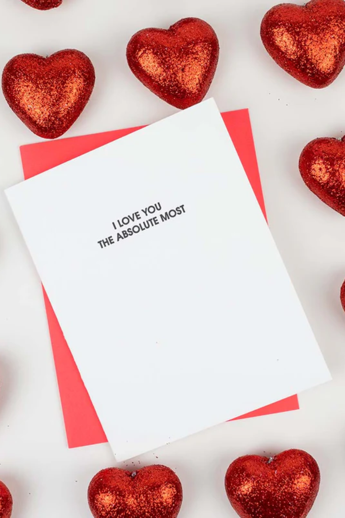 Card with 'I Love You The Absolute Most' text surrounded by red hearts on a white background