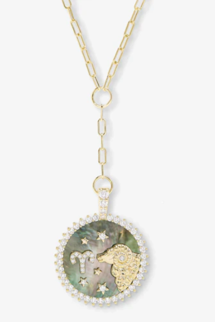Necklace with a pendant featuring a zodiac sign on a white background