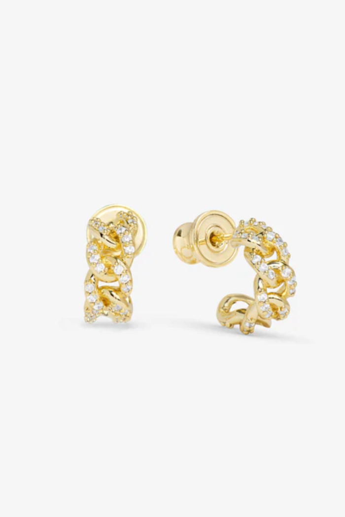 Gold hoop earrings with embedded stones on a white background