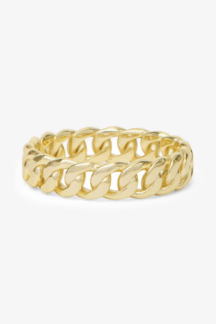 Gold chain-style ring on a white background