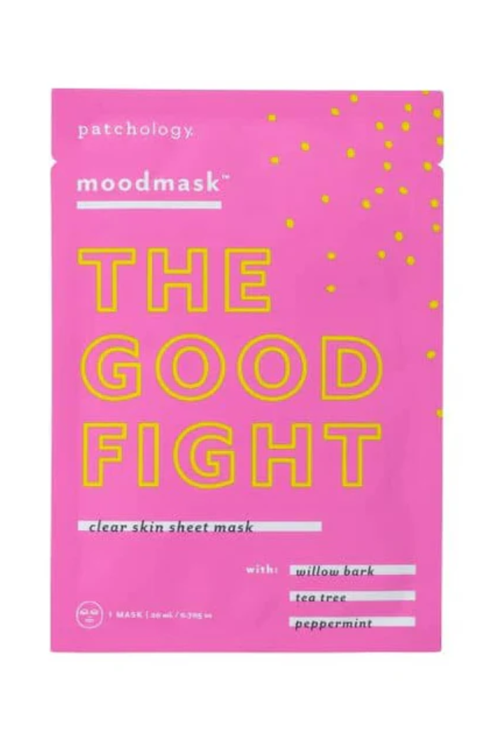 Pink sheet mask packaging with yellow text on a white background