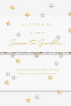 Card with gold and silver stars and text 'A Little Season to Sparkle' by A Littles & Co.