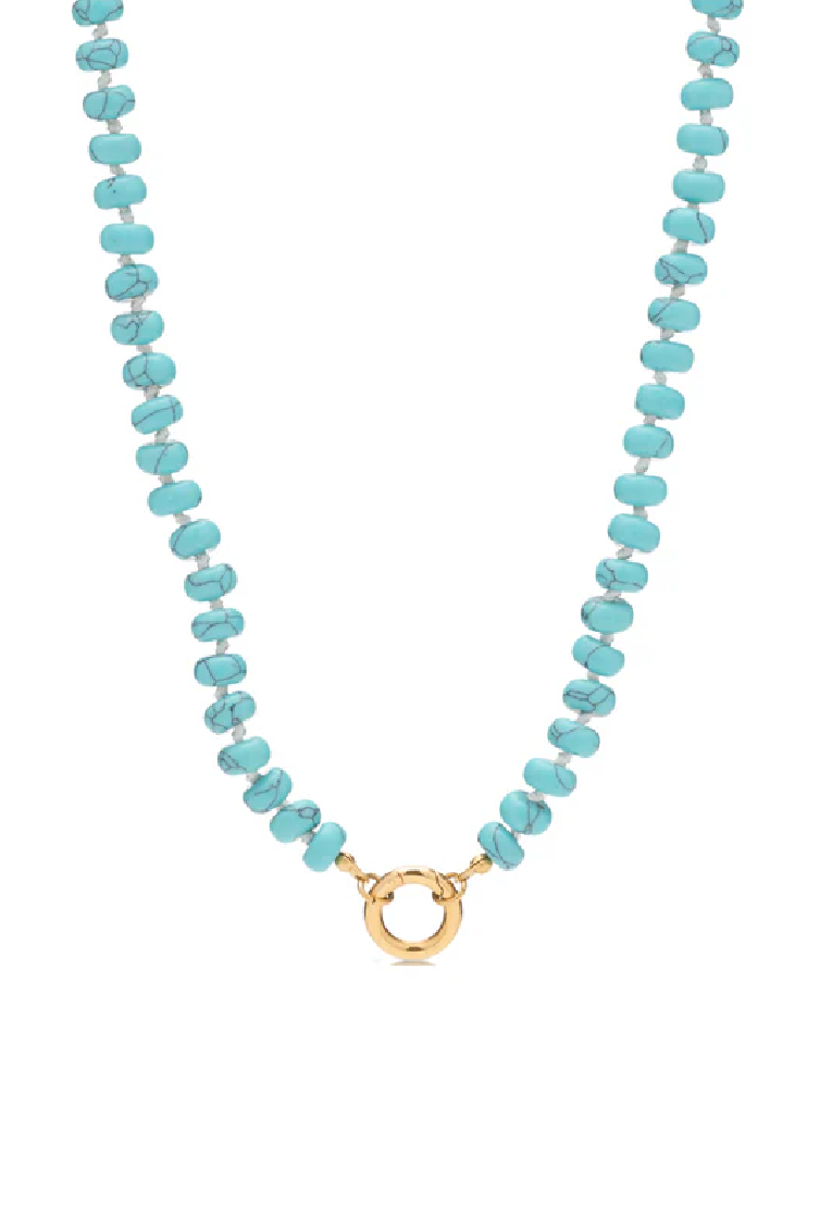 Turquoise beaded necklace with a gold clasp on a white background