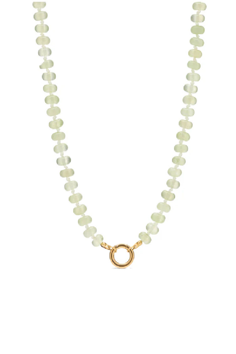 Necklace with light green beads and a gold clasp on a white background