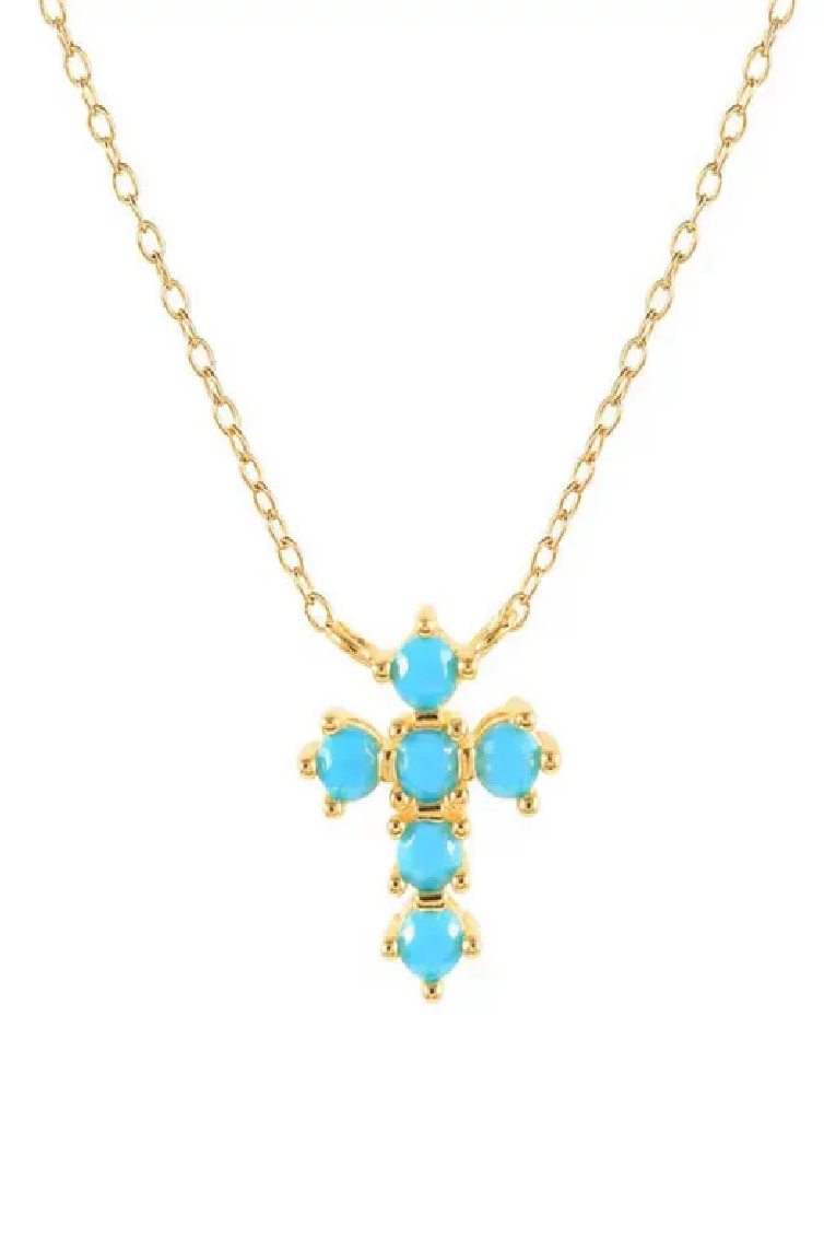 Gold necklace with turquoise stones on a white background