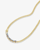 Close-up of gold Cuban chain necklace with iridescent labradorite stones and box clasp